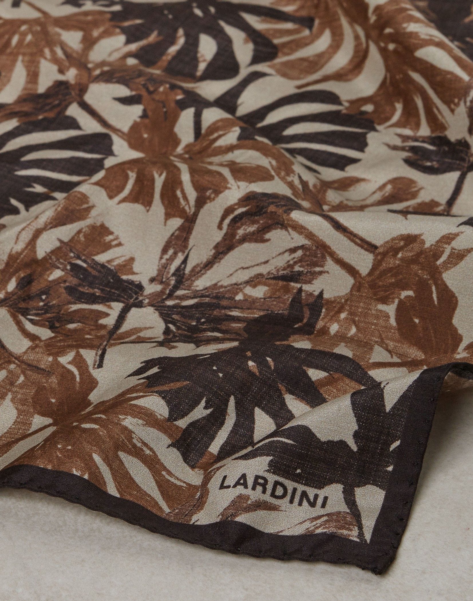 Brown linen and cotton pocket square with an exotic print