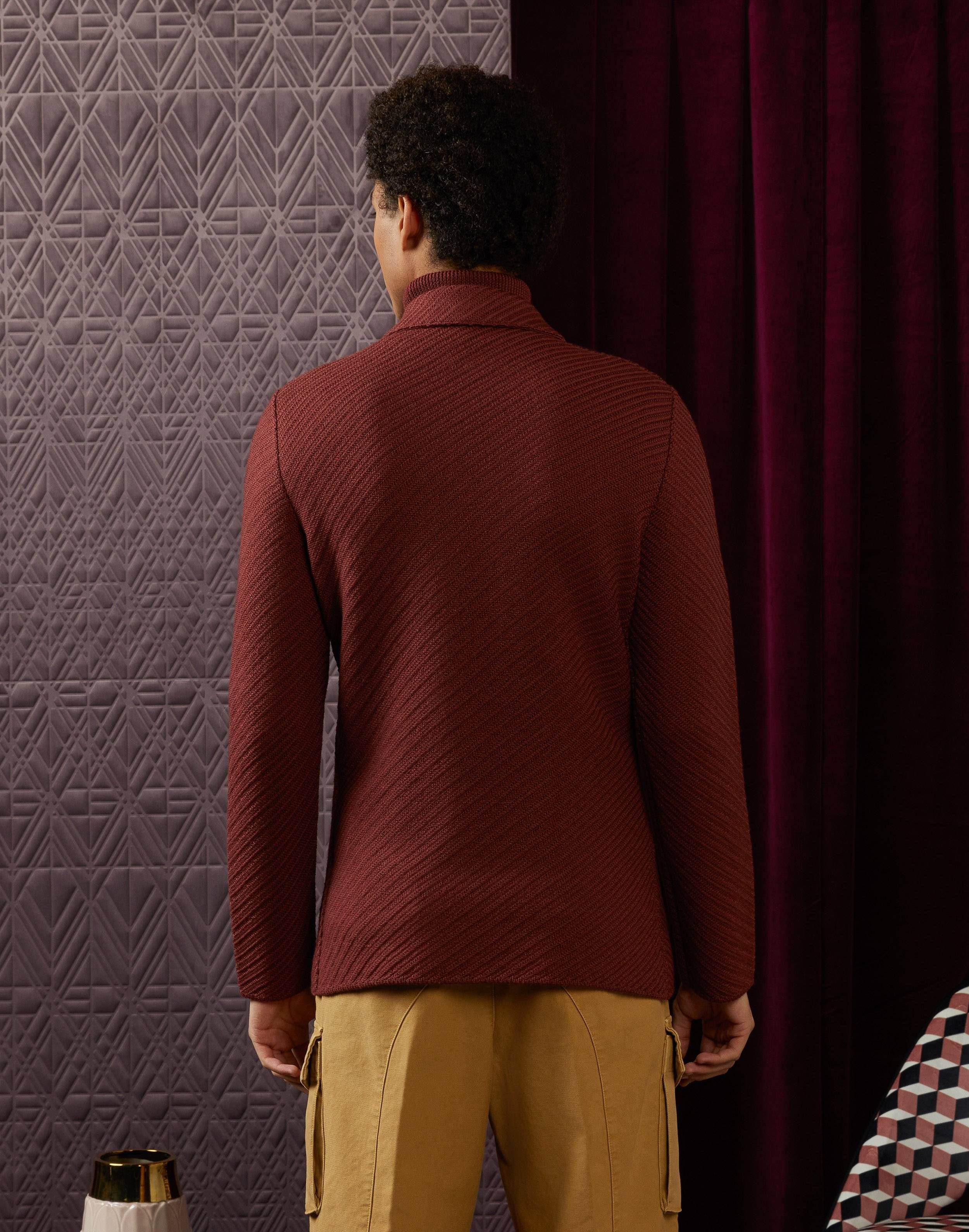 Double-breasted knitted jacket with diagonal jacquard patterning