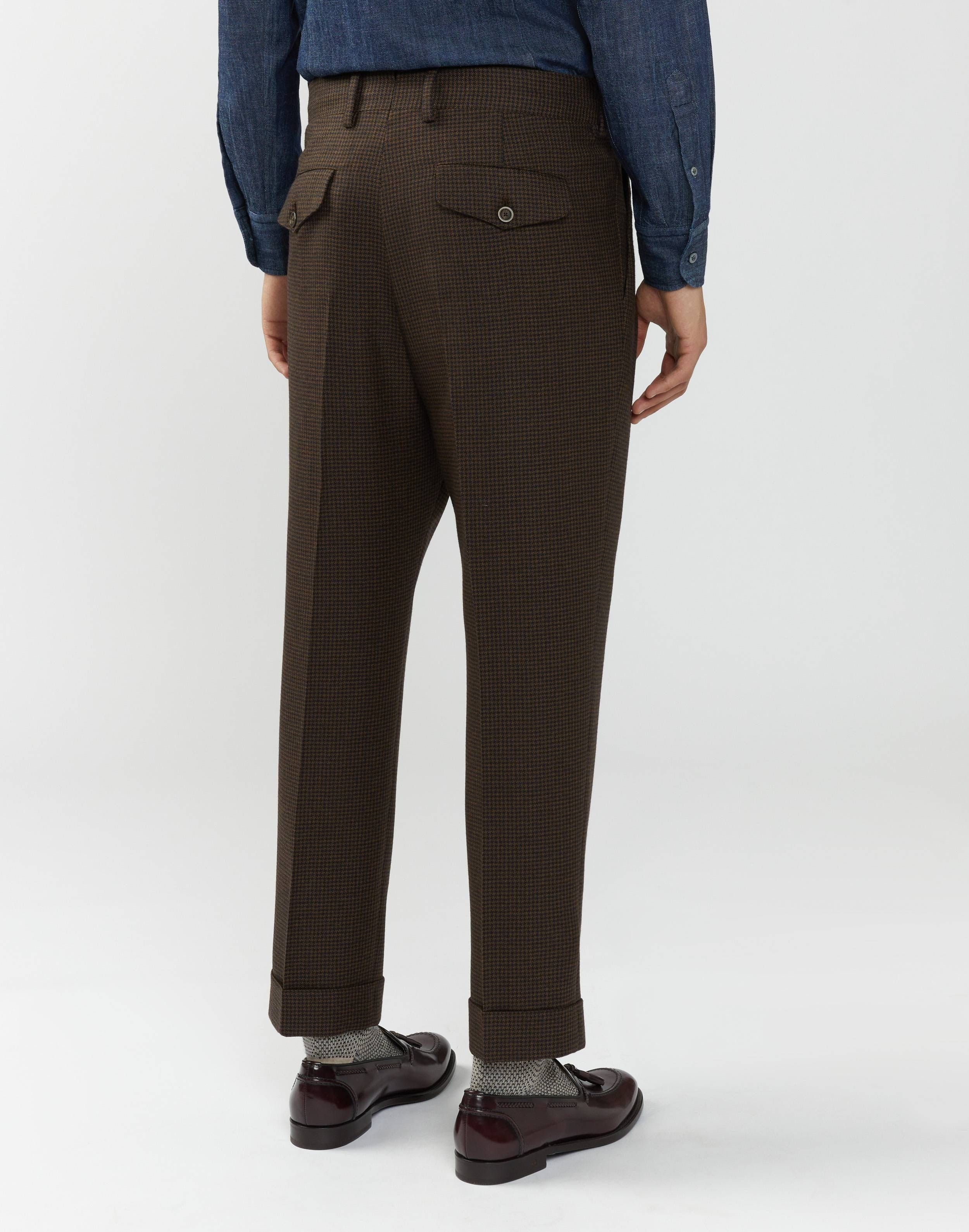Double-pleat trousers in a blue-and-brown micro houndstooth pattern