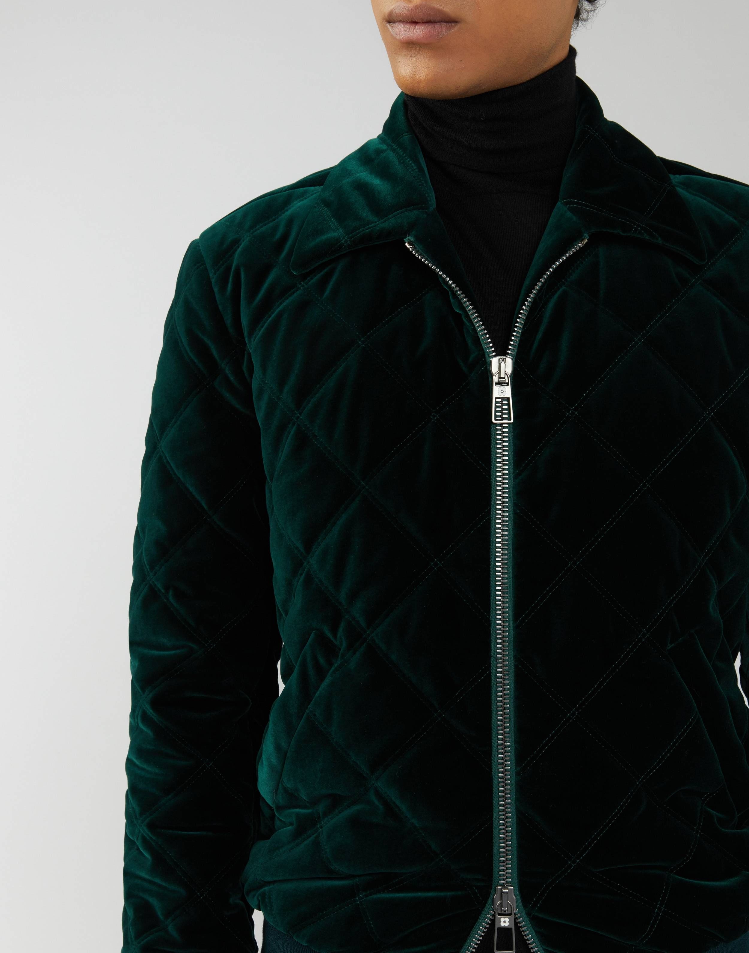 Short jacket in quilted green velvet 