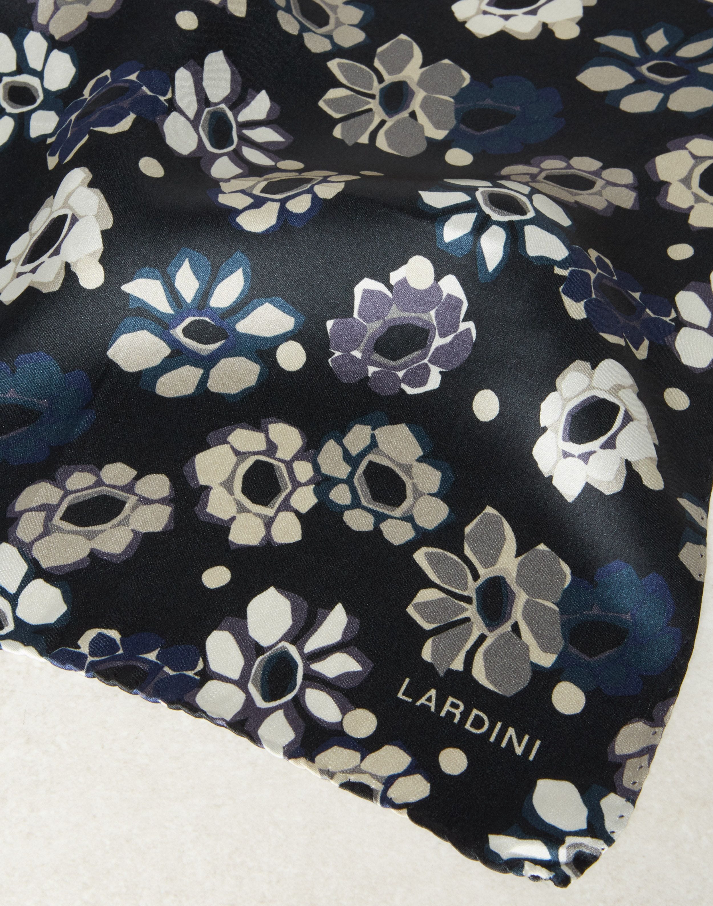 Pocket square in blueand grey silk with flower detail