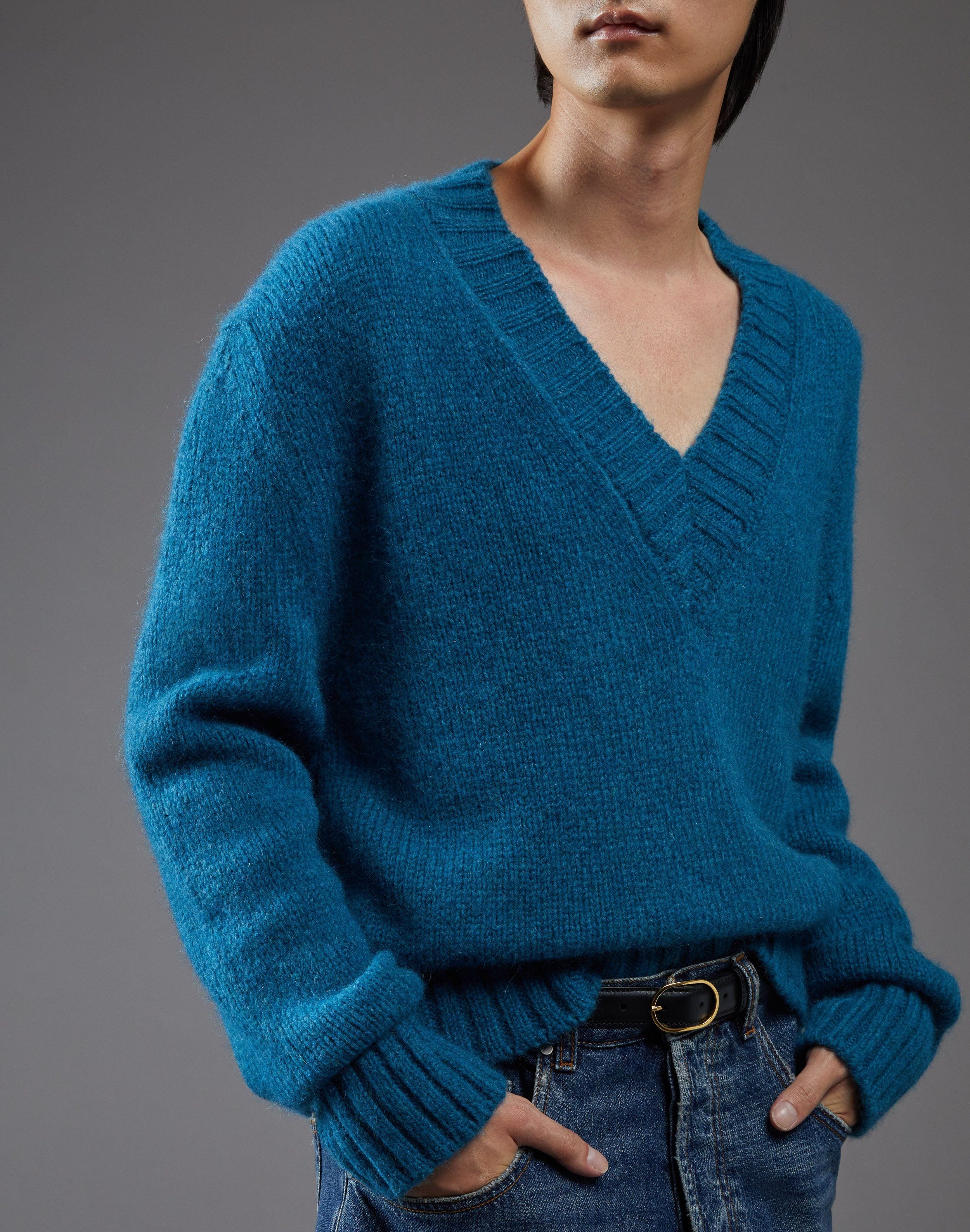 Teal V-neck sweater