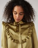 Shirt in green silk with ruffles and bow embellishment 1