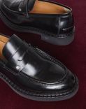Black calfskin loafers with an apron. 1