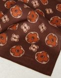 Brown and orange pocket square with a flower print 2