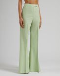 Green high-waisted trousers with a flared hem in stretch wool cloth 2