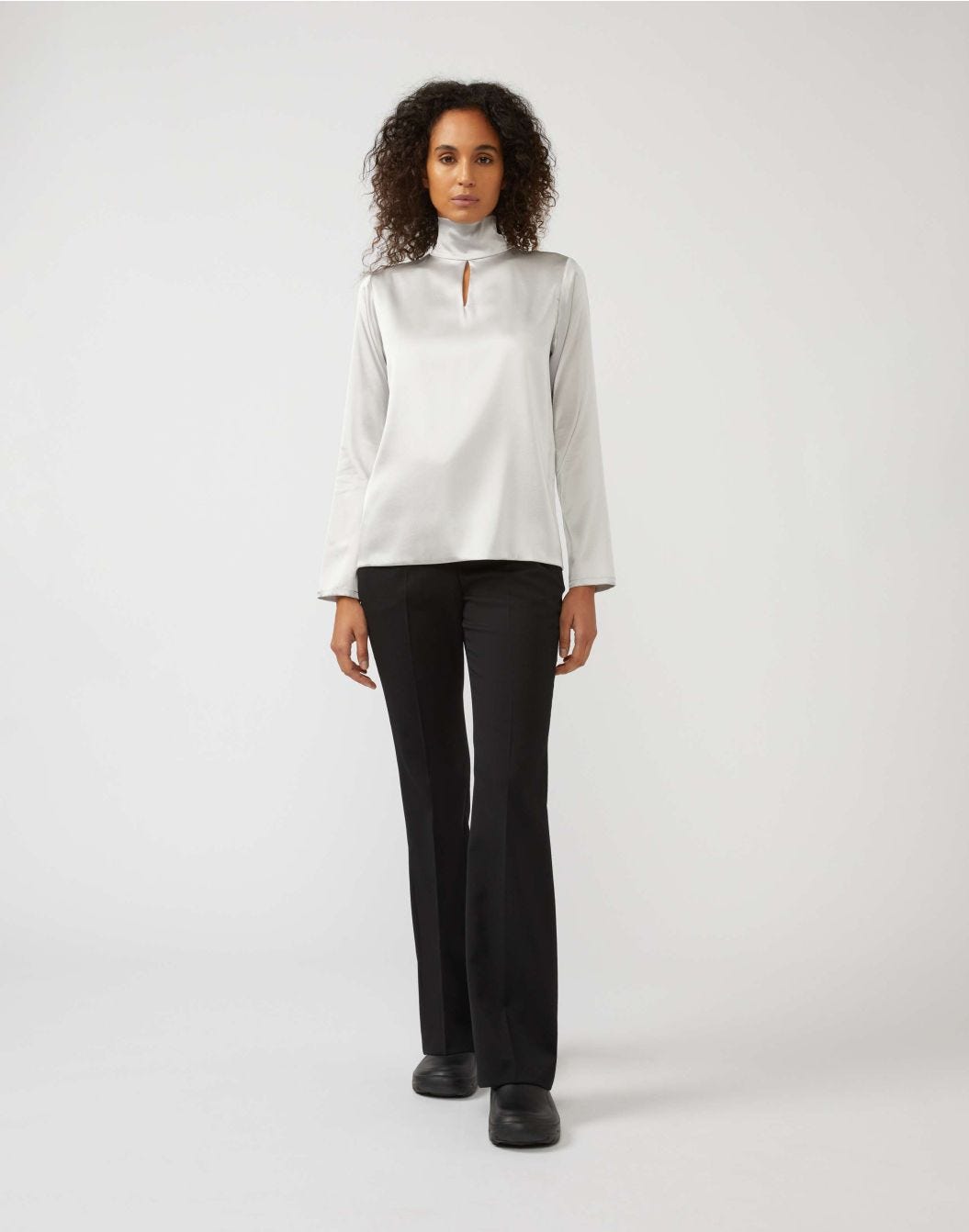 Grey high-neck top in stretch silk satin with a bow embellishment