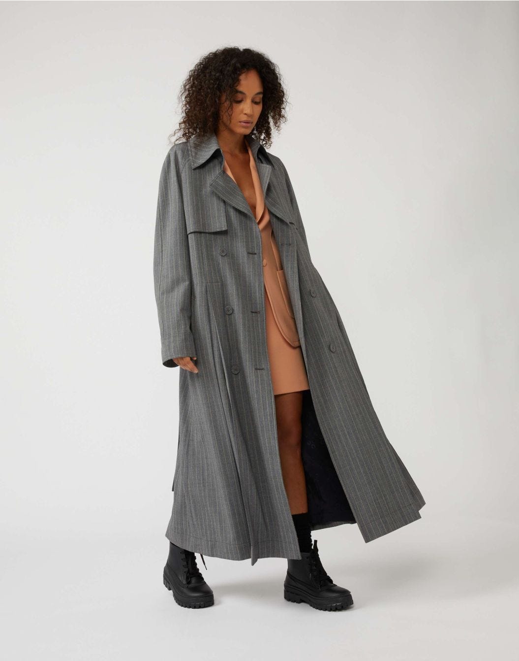 Double-breasted pinstripe trench coat in wool with a belt