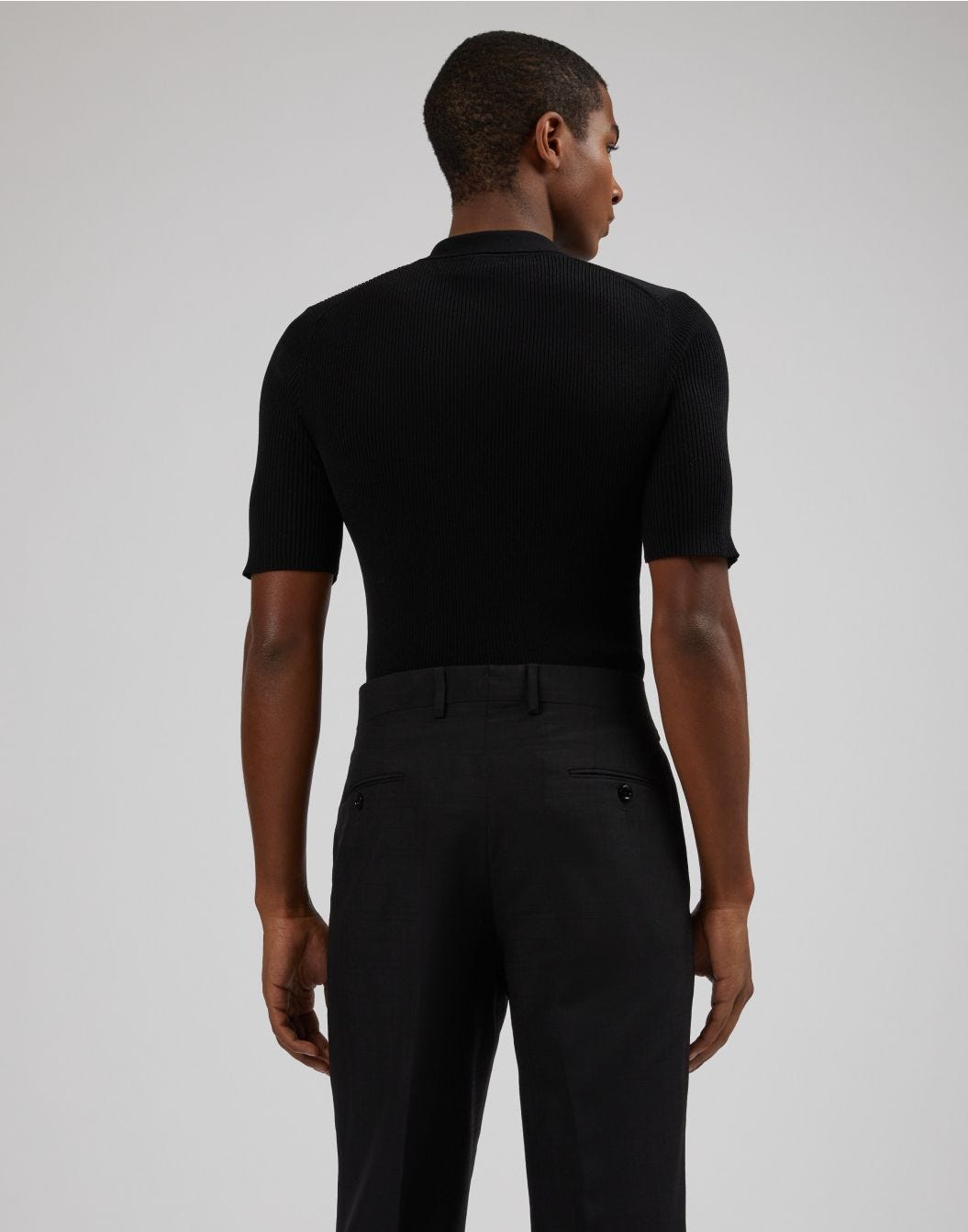 Black buttoned polo shirt with a rib knit