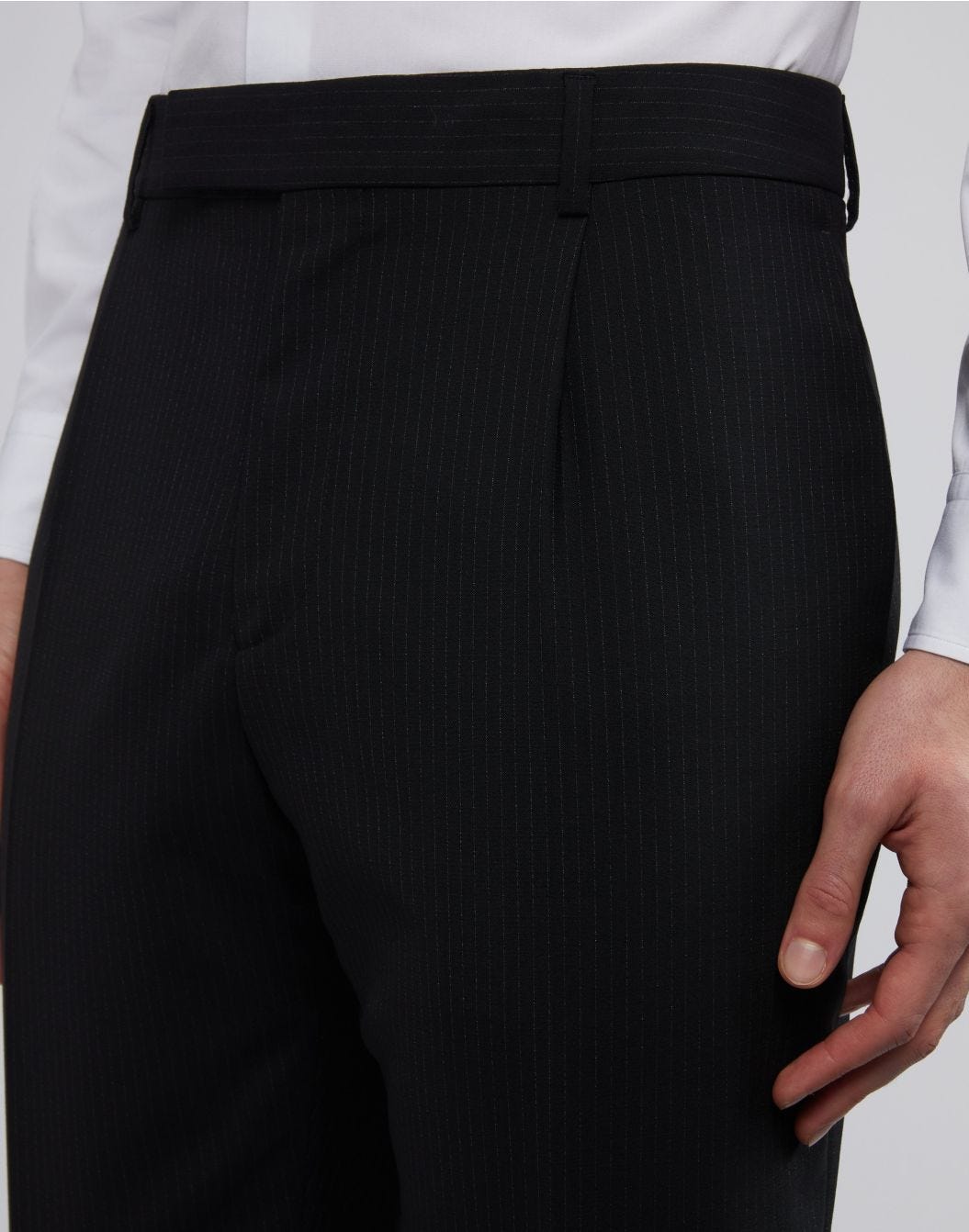 Black trousers with contrasting pinstripes