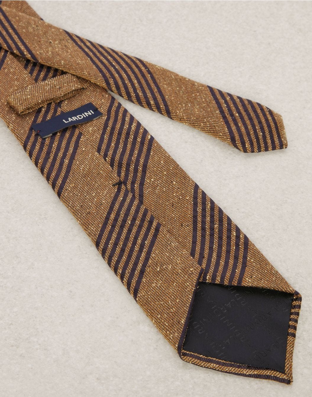 Classic camel-brown tie with blue stripes 