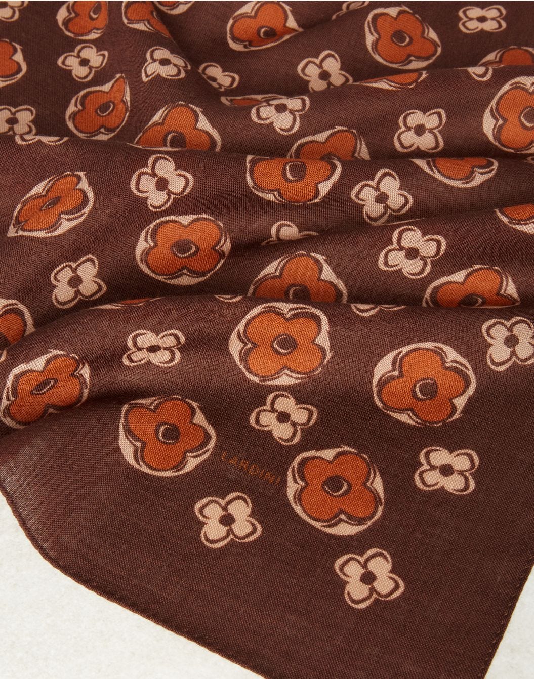Scarf in brown and orange wool with flower detail