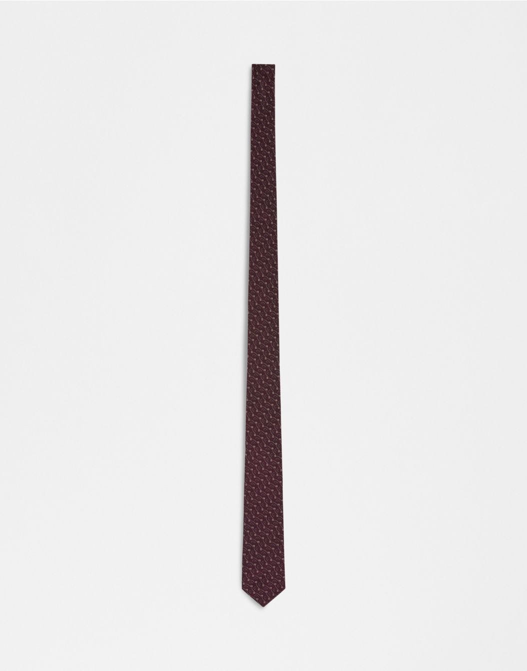 Cravatta in seta con stampa bordeaux, beige e nero
