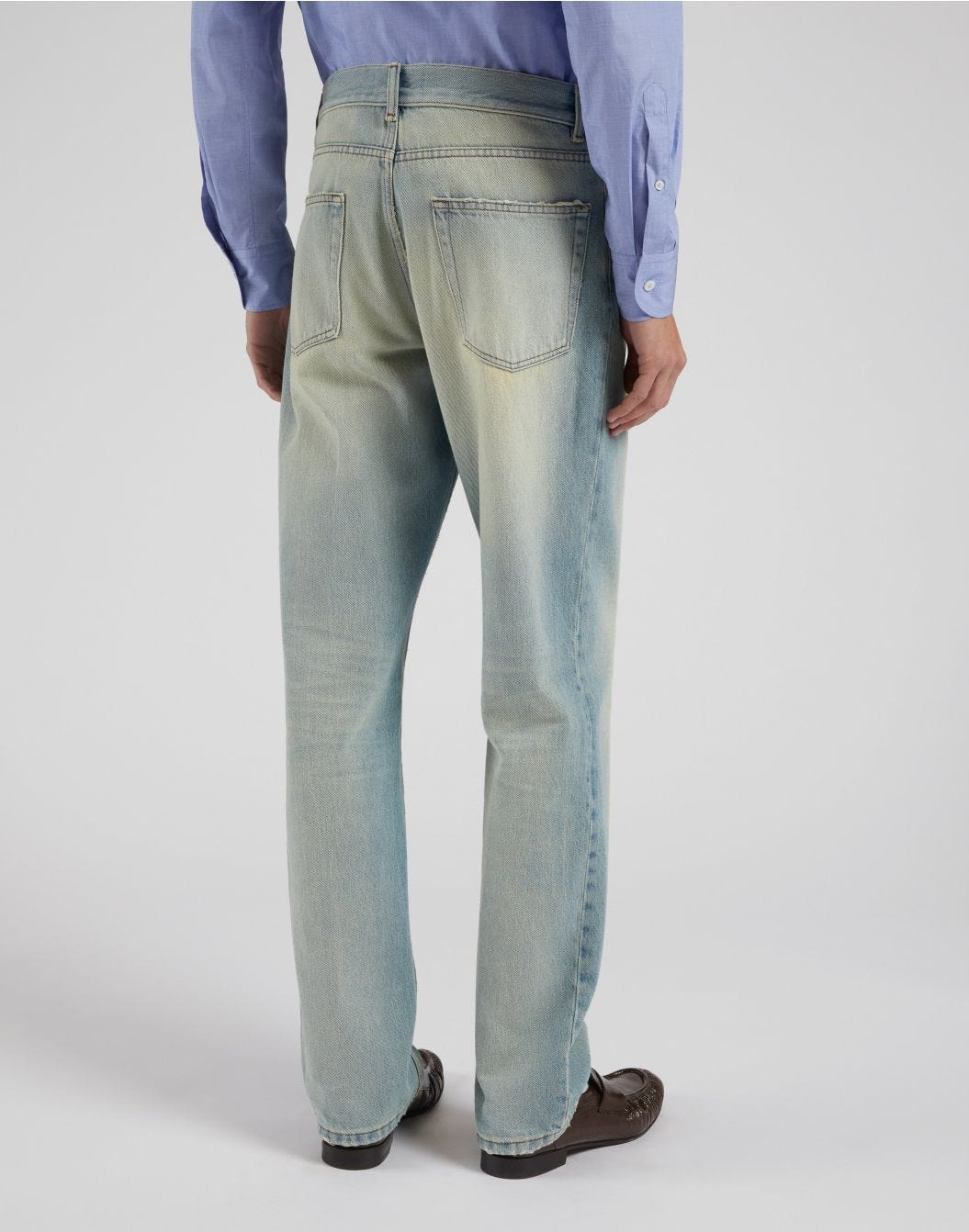 Jeans blu in denim con trattamento 
