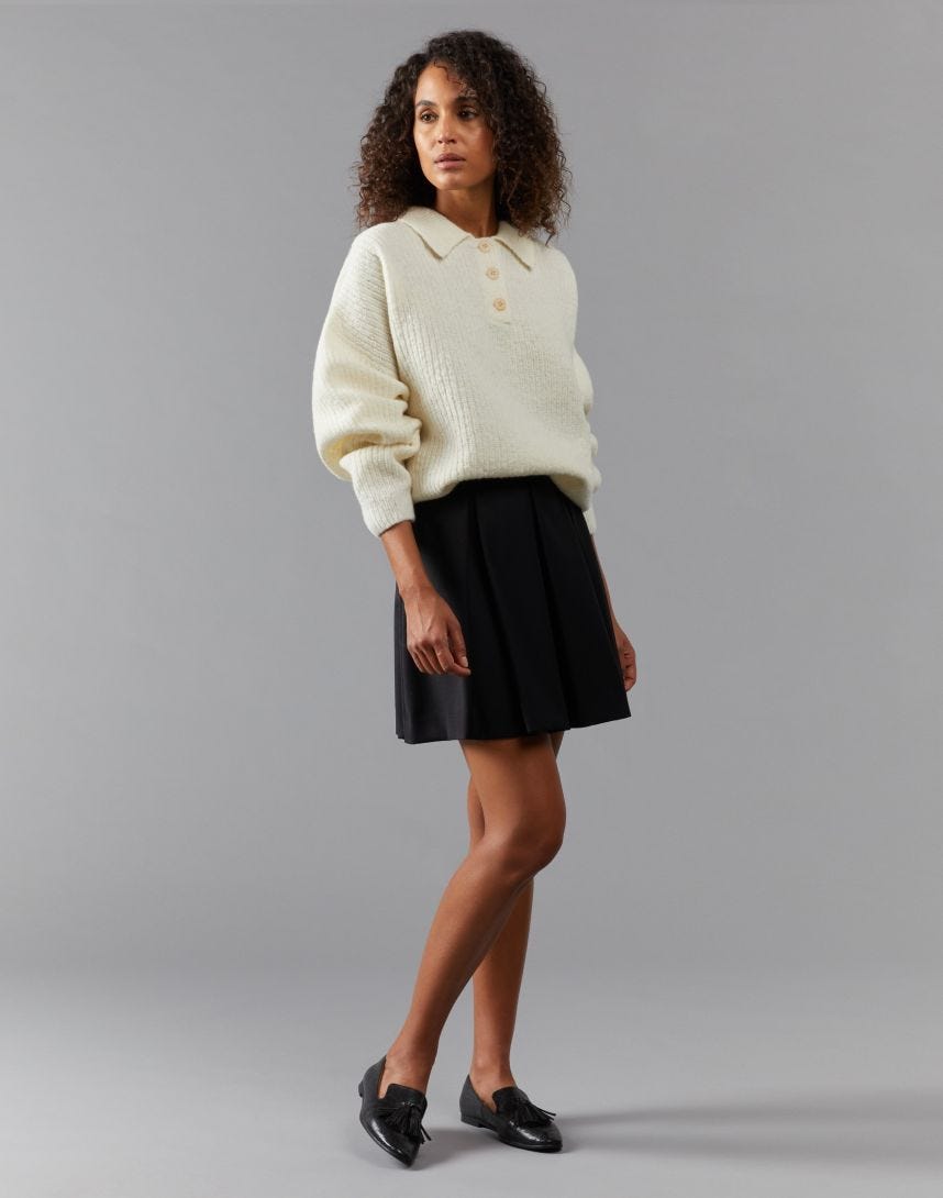 Short pleated skirt in virgin wool