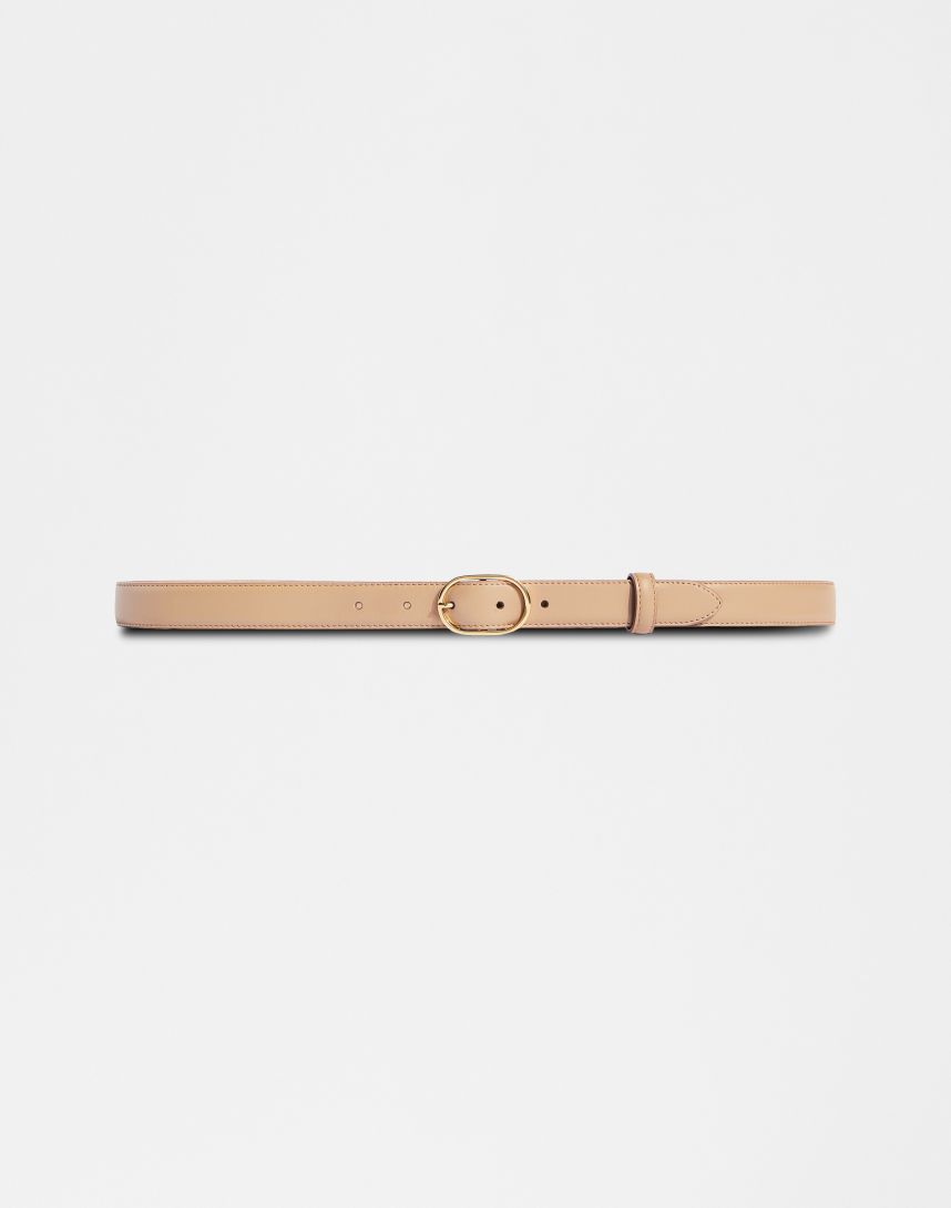 Beige leather belt with an oval buckle