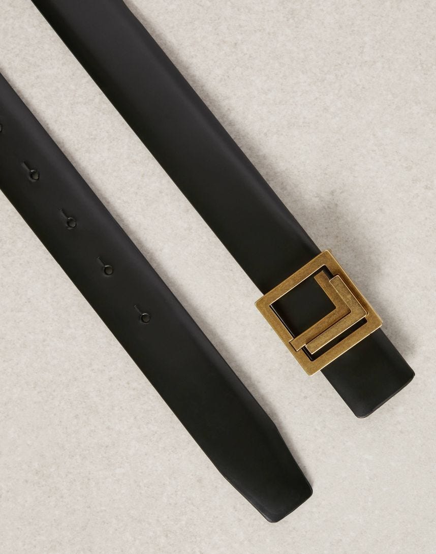 Black belt with double L monogram in brass