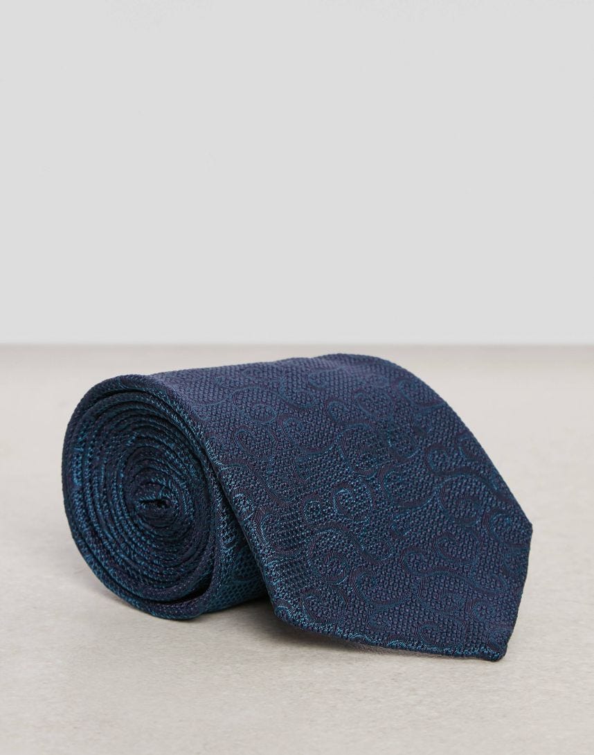 Cravate en soie jacquard avec motif géométrique