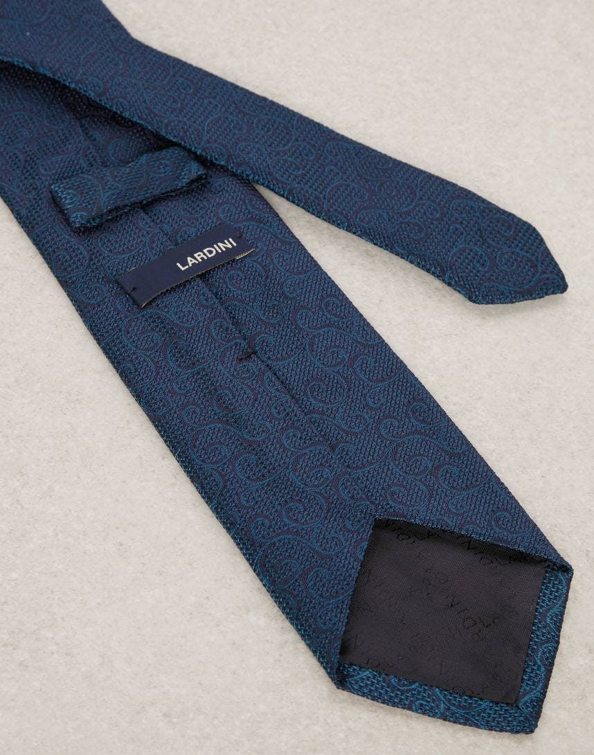 Cravatta in seta jacquard con disegno geometrico