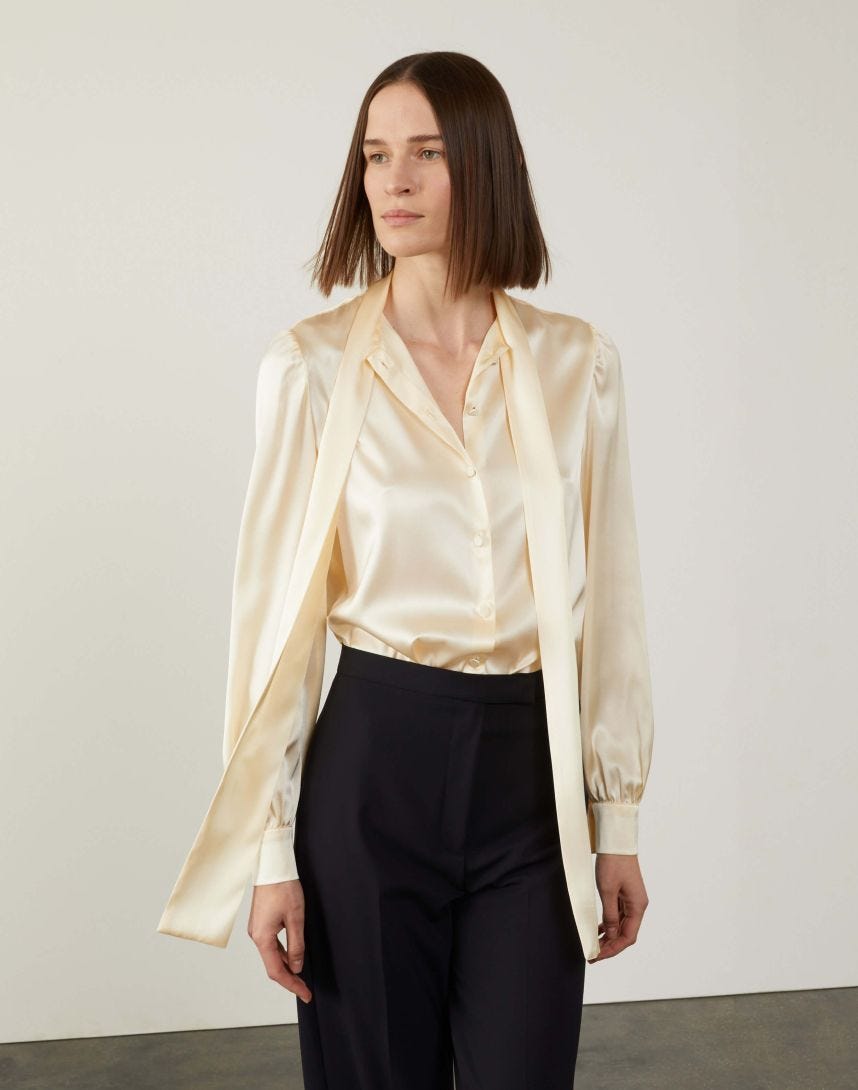 Beige straight shirt with bow