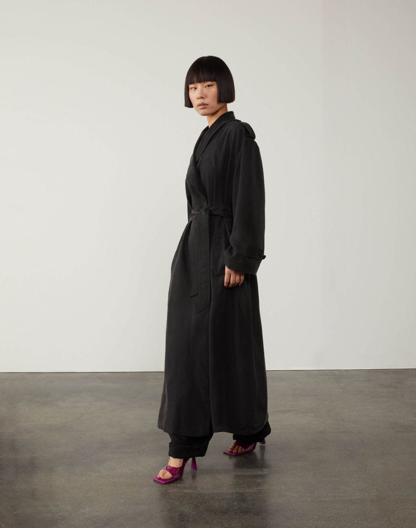 Black lined loose-fitting trench coat