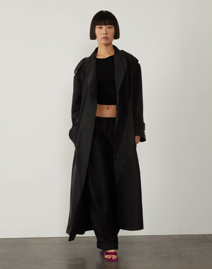 Black lined loose-fitting trench coat